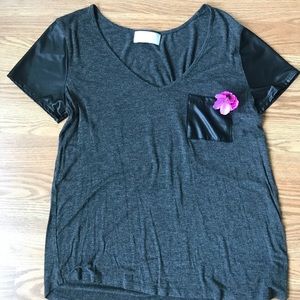 Dark gray shirt with pleather sleeves and pocket